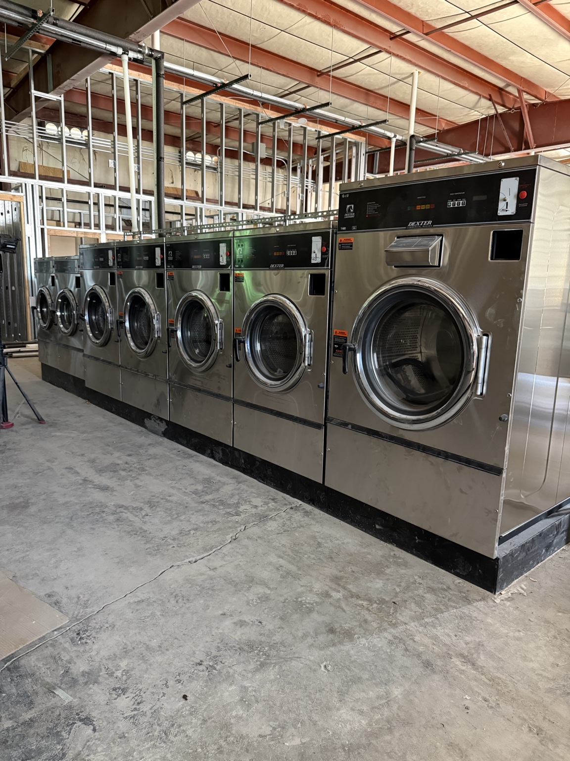 Row of Dexter commercial washers at a Suds and Service installation project